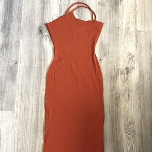 Naked wardrobe dress: Burnt orange one shoulder shape wear midi dress.